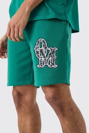 Loose Mid Length Applique Shorts | boohooMAN UK